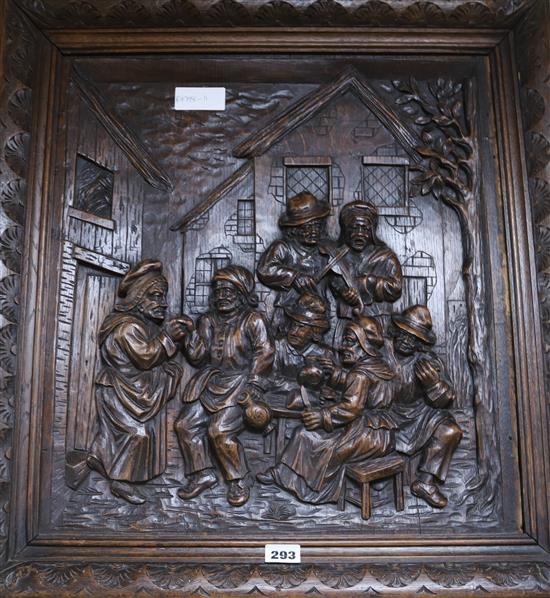 A Dutch style carved oak panel